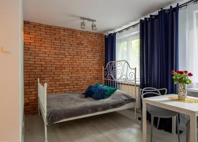 Łóżko lub łóżka w pokoju w obiekcie Apartament Fifi