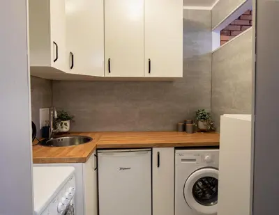 Kuchnia lub aneks kuchenny w obiekcie Apartament Fifi
