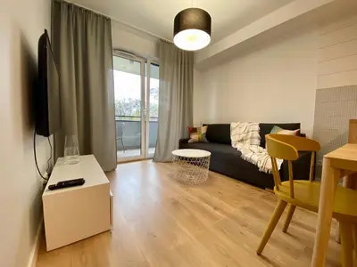 Telewizja i/lub zestaw kina domowego w obiekcie Comfortable apartments Warsaw West III