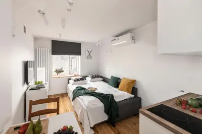 Łóżko lub łóżka w pokoju w obiekcie ShortStayPoland Wilcza (B42)
