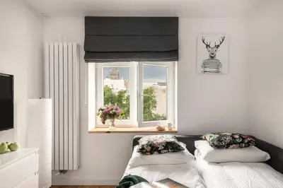 Łóżko lub łóżka w pokoju w obiekcie ShortStayPoland Wilcza (B42)
