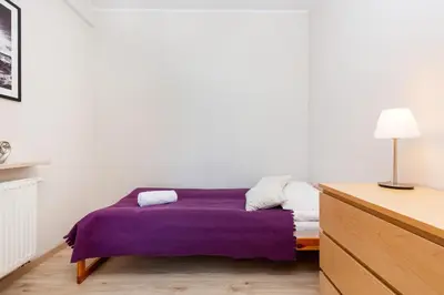 Łóżko lub łóżka w pokoju w obiekcie Apartamenty Bliska Praga by Noclegi Renters
