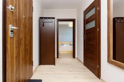 Łóżko lub łóżka w pokoju w obiekcie Apartamenty Bliska Praga by Noclegi Renters