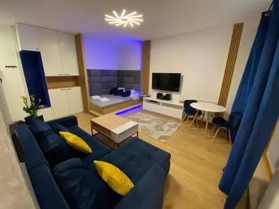 Telewizja i/lub zestaw kina domowego w obiekcie Secret Apartments Chełmska