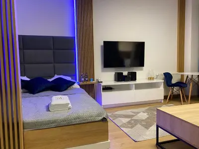 Telewizja i/lub zestaw kina domowego w obiekcie Secret Apartments Chełmska