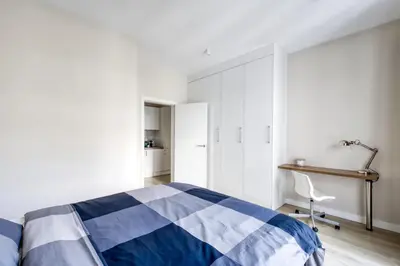 Łóżko lub łóżka w pokoju w obiekcie City Apartments Warsaw