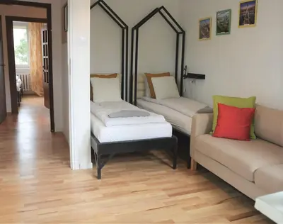 Łóżko lub łóżka w pokoju w obiekcie Labo Apartment Metro Wierzbno