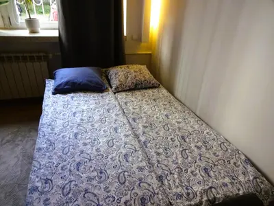 Łóżko lub łóżka w pokoju w obiekcie Apartament Wspólna Elango