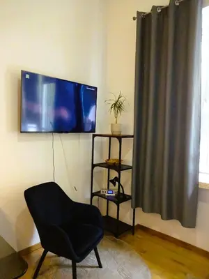 Telewizja i/lub zestaw kina domowego w obiekcie Apartament Wspólna Elango
