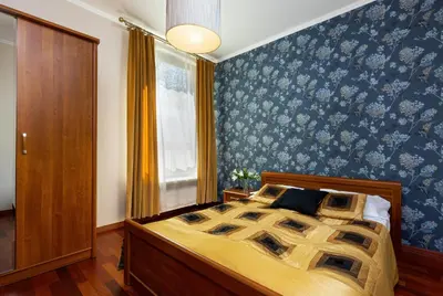 Łóżko lub łóżka w pokoju w obiekcie Apartments Mokotów Obrzeżna by Noclegi Renters