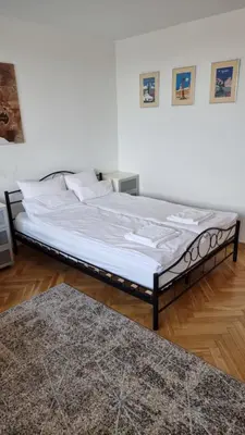 Łóżko lub łóżka w pokoju w obiekcie Like Home Flat B
