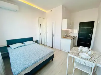 Łóżko lub łóżka w pokoju w obiekcie Apartamenty Smolna 11