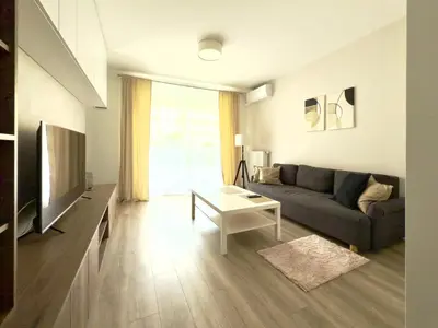 Telewizja i/lub zestaw kina domowego w obiekcie Vizja Apartments Kolska 9