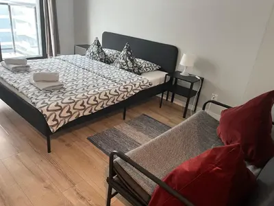Łóżko lub łóżka w pokoju w obiekcie Studio Apartment