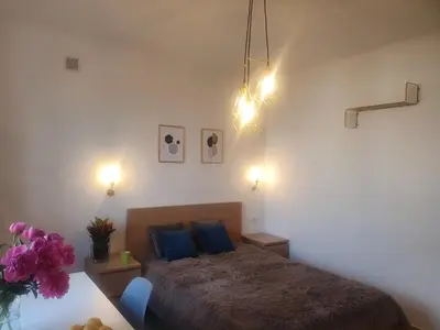 Łóżko lub łóżka w pokoju w obiekcie Flat Femina Street