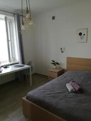 Łóżko lub łóżka w pokoju w obiekcie Flat Femina Street