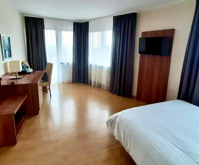 Łóżko lub łóżka w pokoju w obiekcie Poleczki Residence Apartments