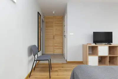 Telewizja i/lub zestaw kina domowego w obiekcie Apartments City Center Powiśle by Noclegi Renters