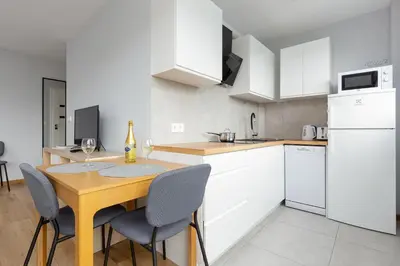 Kuchnia lub aneks kuchenny w obiekcie Apartments City Center Powiśle by Noclegi Renters