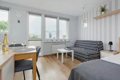 Część wypoczynkowa w obiekcie Apartments City Center Powiśle by Noclegi Renters