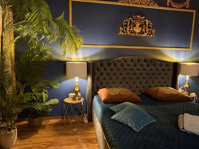 Łóżko lub łóżka w pokoju w obiekcie Exclusive Apartment Chmielna Street 95m2