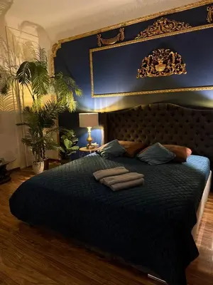 Łóżko lub łóżka w pokoju w obiekcie Exclusive Apartment Chmielna Street 95m2
