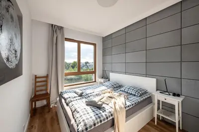 Łóżko lub łóżka w pokoju w obiekcie Waw - Apartamenty Wilanów III Zdrowa