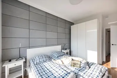 Łóżko lub łóżka w pokoju w obiekcie Waw - Apartamenty Wilanów III Zdrowa