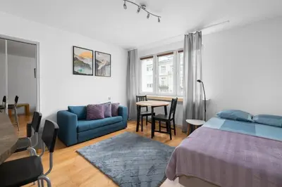 Łóżko lub łóżka w pokoju w obiekcie Warsaw Central Apartment Złota