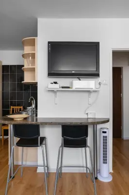 Telewizja i/lub zestaw kina domowego w obiekcie Warsaw Central Apartment Złota