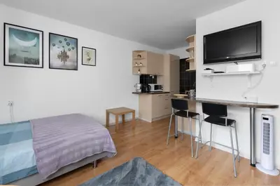 Telewizja i/lub zestaw kina domowego w obiekcie Warsaw Central Apartment Złota