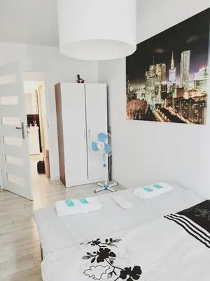 Łóżko lub łóżka w pokoju w obiekcie Apartament Centrum Jana Pawła II