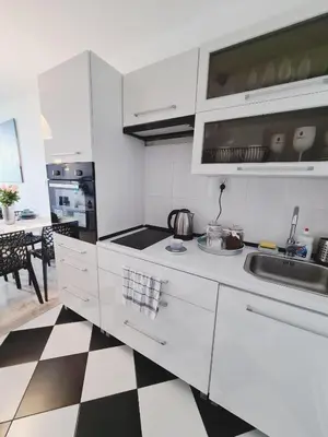 Kuchnia lub aneks kuchenny w obiekcie Apartament Centrum Jana Pawła II