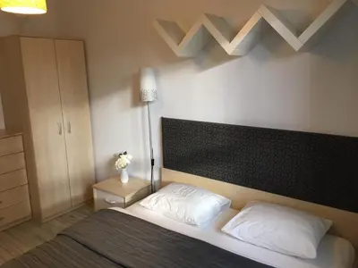 Łóżko lub łóżka w pokoju w obiekcie Apartament Stanczyka 2
