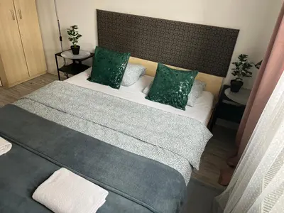 Łóżko lub łóżka w pokoju w obiekcie Apartament Stanczyka 2