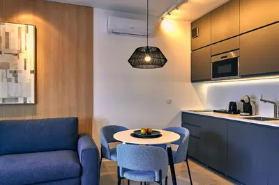 Kuchnia lub aneks kuchenny w obiekcie MENNICA RESIDENCE SUITE APARTMENTS