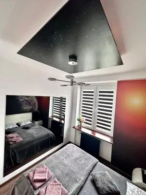 Łóżko lub łóżka w pokoju w obiekcie Space Apartment 2 rooms Center