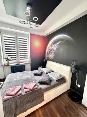 Łóżko lub łóżka w pokoju w obiekcie Space Apartment 2 rooms Center
