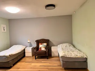 Łóżko lub łóżka w pokoju w obiekcie Green Albatros 48m with bathroom