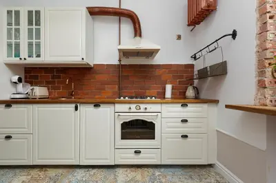 Kuchnia lub aneks kuchenny w obiekcie Apartment on the Warsaw Square by Noclegi Renters