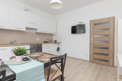 Kuchnia lub aneks kuchenny w obiekcie Mokotowska Comfortable Apartment by BookingHost