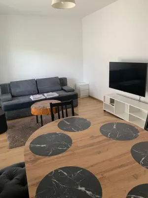 Telewizja i/lub zestaw kina domowego w obiekcie Apartament105Mokotow