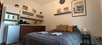 Łóżko lub łóżka w pokoju w obiekcie Labo Apartment Kasprzaka