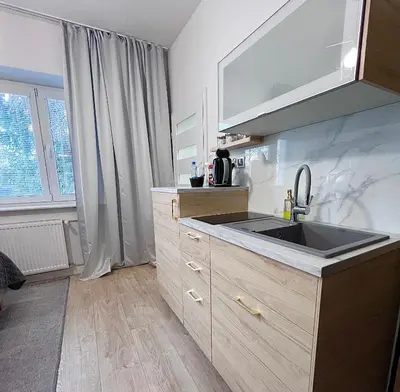 Kuchnia lub aneks kuchenny w obiekcie Pokoje i Apartamenty Willa Bielany