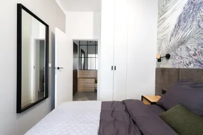 Łóżko lub łóżka w pokoju w obiekcie Apartament Voila