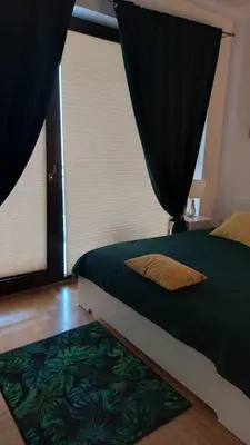Łóżko lub łóżka w pokoju w obiekcie Suzanna Arkadia