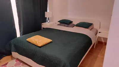 Łóżko lub łóżka w pokoju w obiekcie Suzanna Arkadia