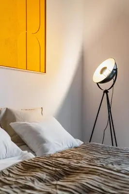 Łóżko lub łóżka w pokoju w obiekcie Warsaw Concierge Koneser