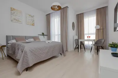 Łóżko lub łóżka w pokoju w obiekcie Golden Apartment Ursynów by Noclegi Renters