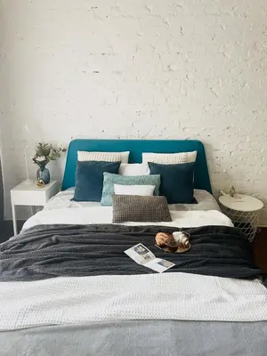 Łóżko lub łóżka w pokoju w obiekcie Warszawa Centrum Designerski Apartament z Wanną